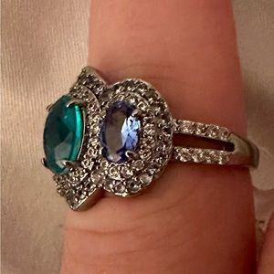 Beautiful Green Tourmaline Ring with simulated London Blue Topaz cz’s